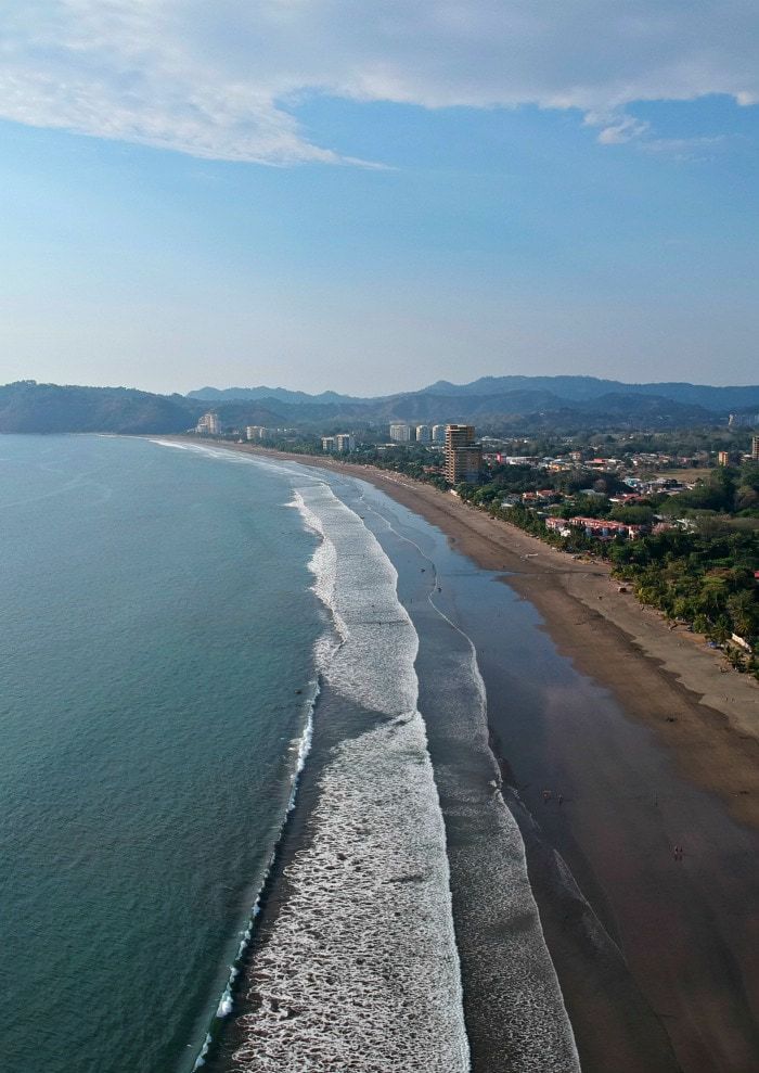 Our top 20 beaches to visit on the Costa Rica Pacific include everything from Costa Rica's cleanest beach, to the biggest party beach, and a beach whose coast is made entirely of small shells. There's a beach for every personality on this list! #costarica #beachlife #familytravel #traveltips #costaricatravel #tmom #beachvacation #vacation